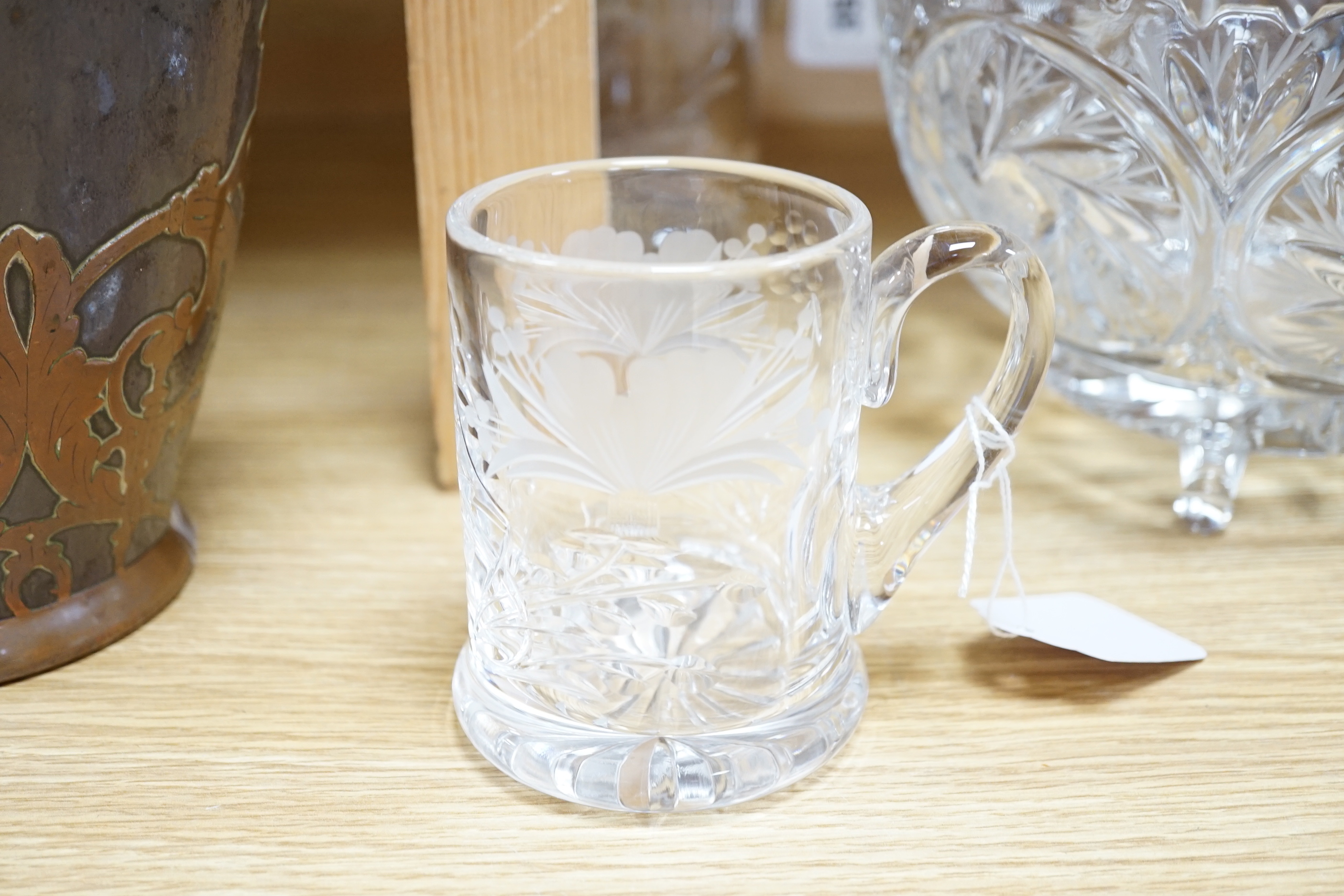 Two deep cut glass jugs, a cylindrical vase, two circular footed bowls and a tankard (6)